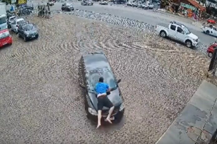 mulher-arrasta-ex-marido-por-2km-para-escapar-de-agressao.-video