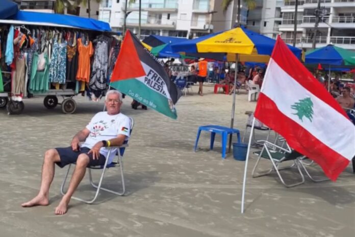 video:-homem-e-atacado-apos-carregar-bandeira-da-palestina-no-litoral