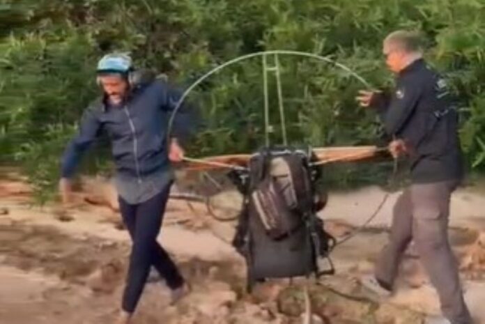 bombeiro-de-folga-resgata-piloto-que-caiu-de-parapente-em-go.-video